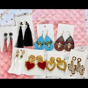 Pack of eight brand new earrings.